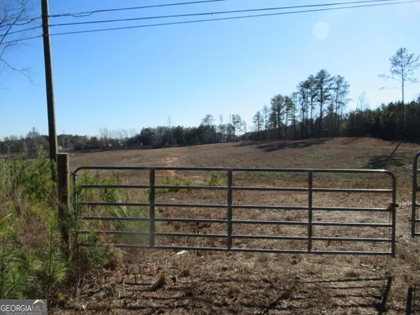 a view of lake with green space
