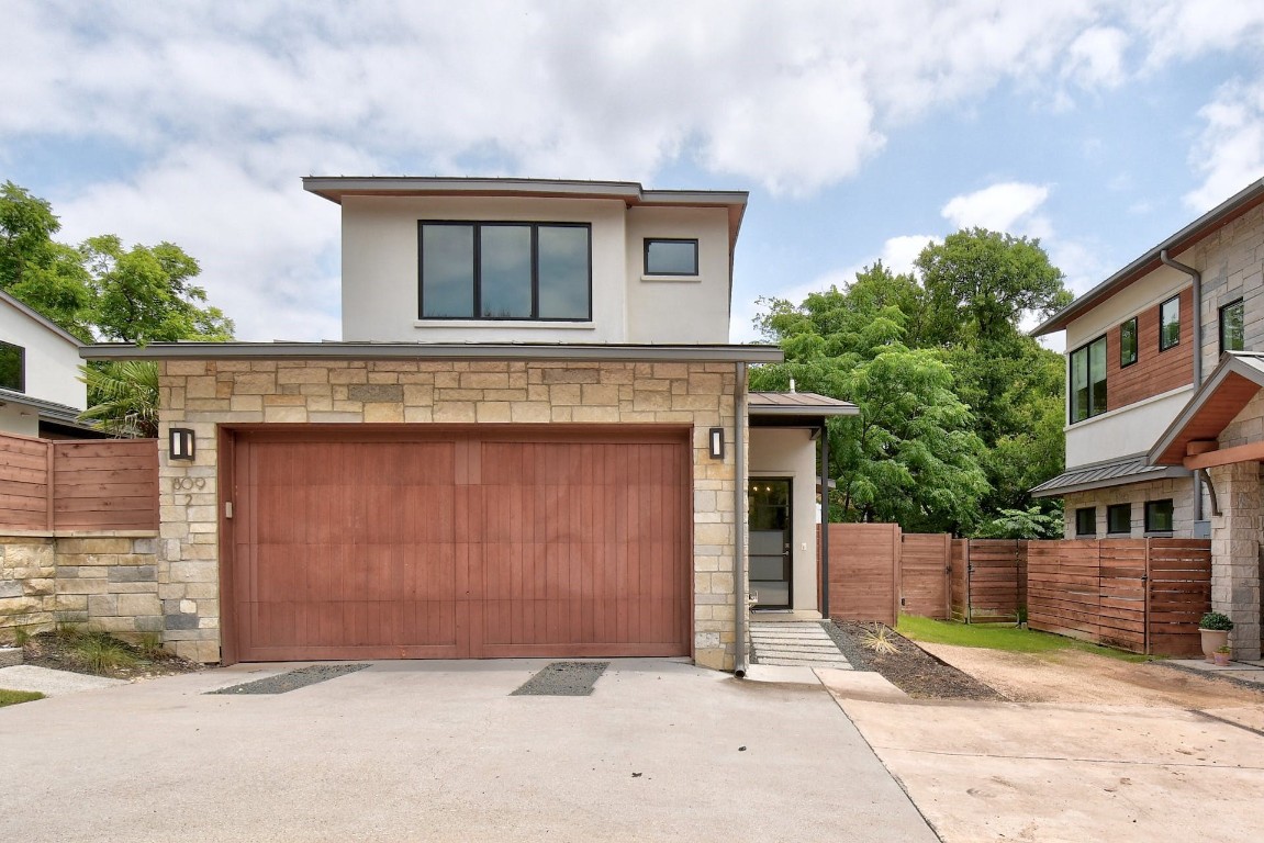 809 Bouldin Avenue Austin, TX 78704 - Photo 1 of 1 a front view of a house with a yard and garage
