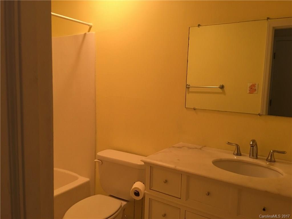 3085 Point Clear Drive Tega Cay, SC 29708 - Photo 12 of 21 a bathroom with a sink a toilet and shower