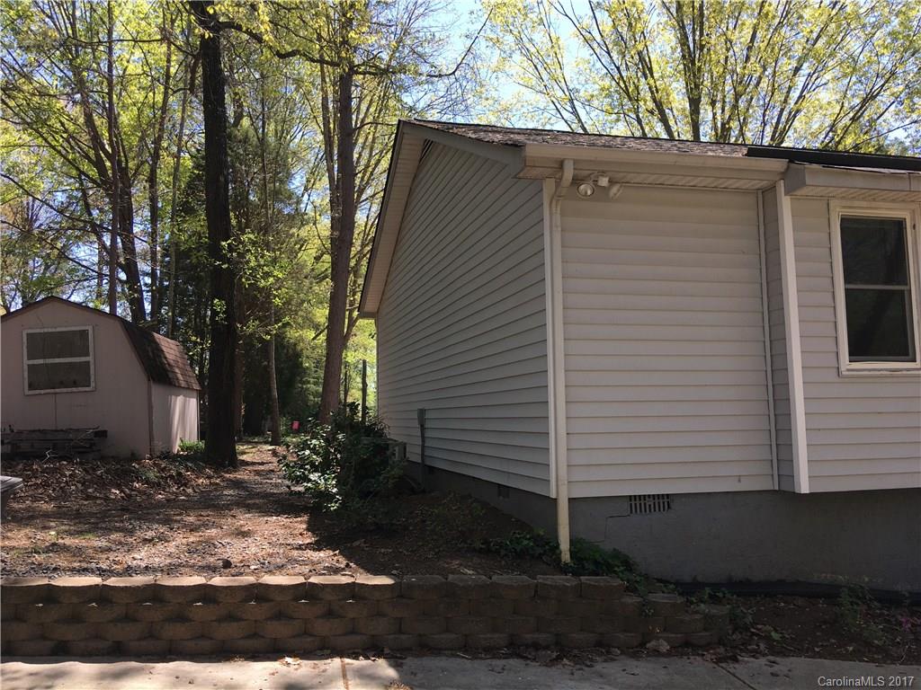 3085 Point Clear Drive Tega Cay, SC 29708 - Photo 20 of 21 a view of a house with a yard