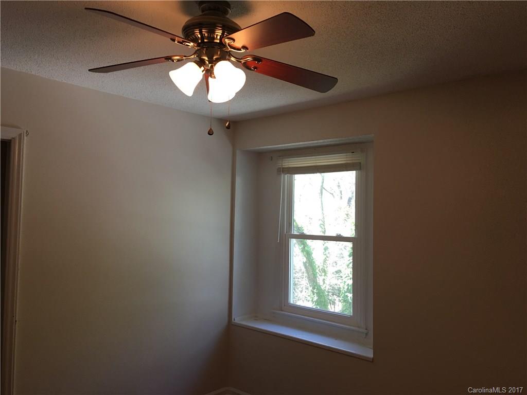 3085 Point Clear Drive Tega Cay, SC 29708 - Photo 10 of 21 a view of an empty room with a window
