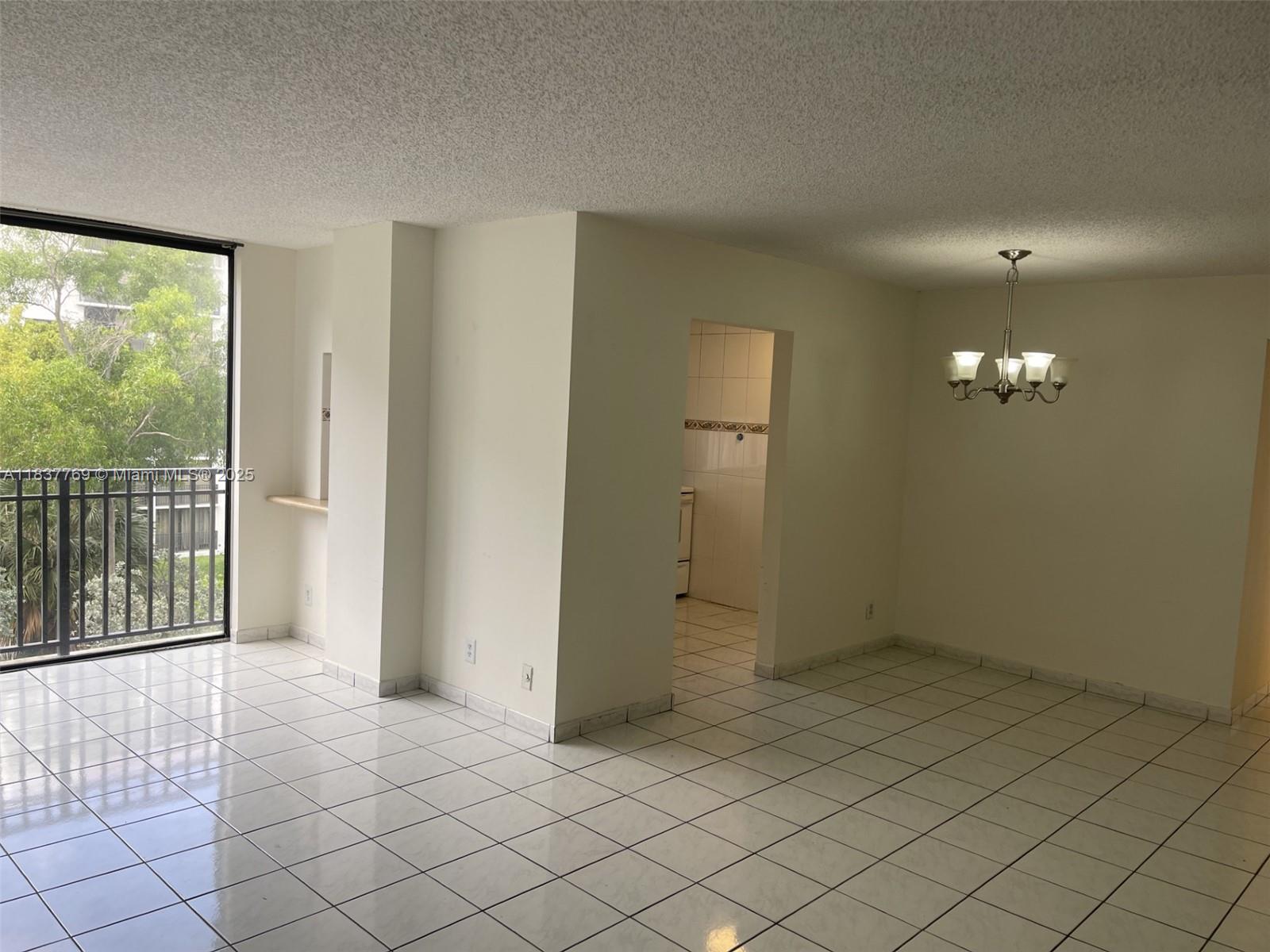 17011 North Bay Road, Unit 406 Sunny Isles Beach, FL 33160 - Photo 12 of 12 an empty room with windows