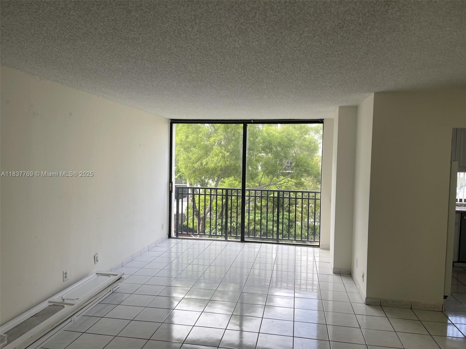 17011 North Bay Road, Unit 406 Sunny Isles Beach, FL 33160 - Photo 2 of 12 a view of an empty room with a window