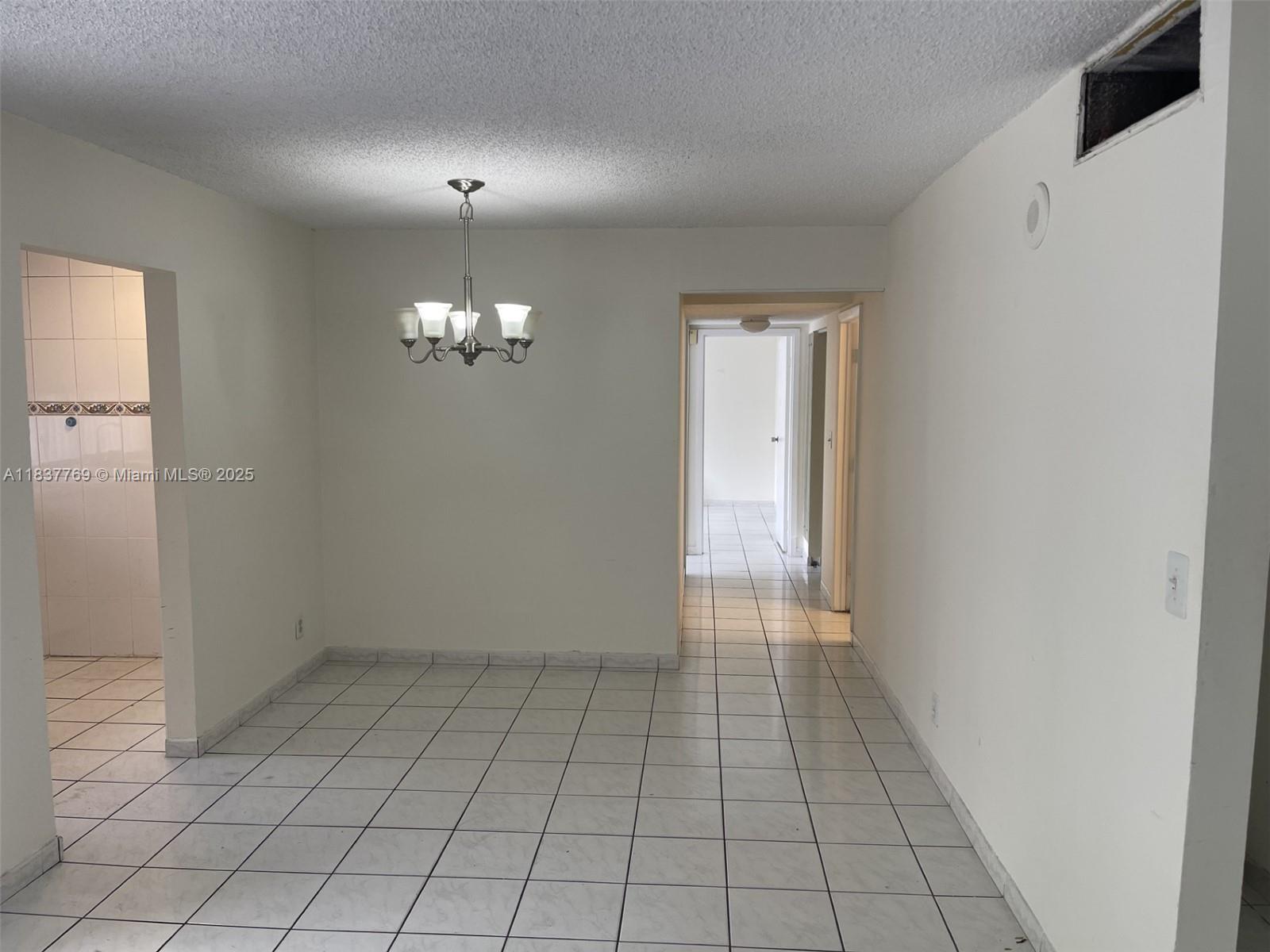 17011 North Bay Road, Unit 406 Sunny Isles Beach, FL 33160 - Photo 4 of 12 a view of an empty room with window
