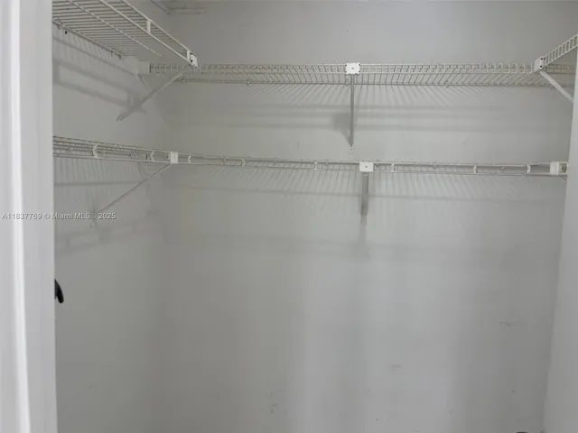 a view of a room with racks on the wall