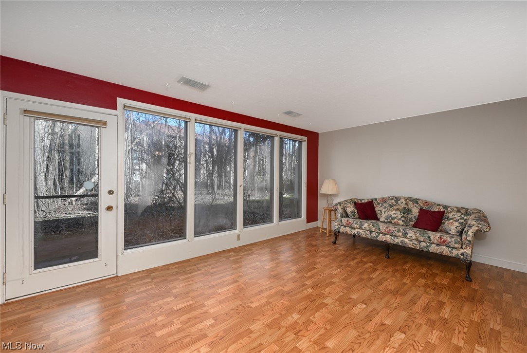 985 Canyon View Road, Unit 103 Northfield, OH 44067 - Photo 4 of 20 Back patio is accessible from the living room.