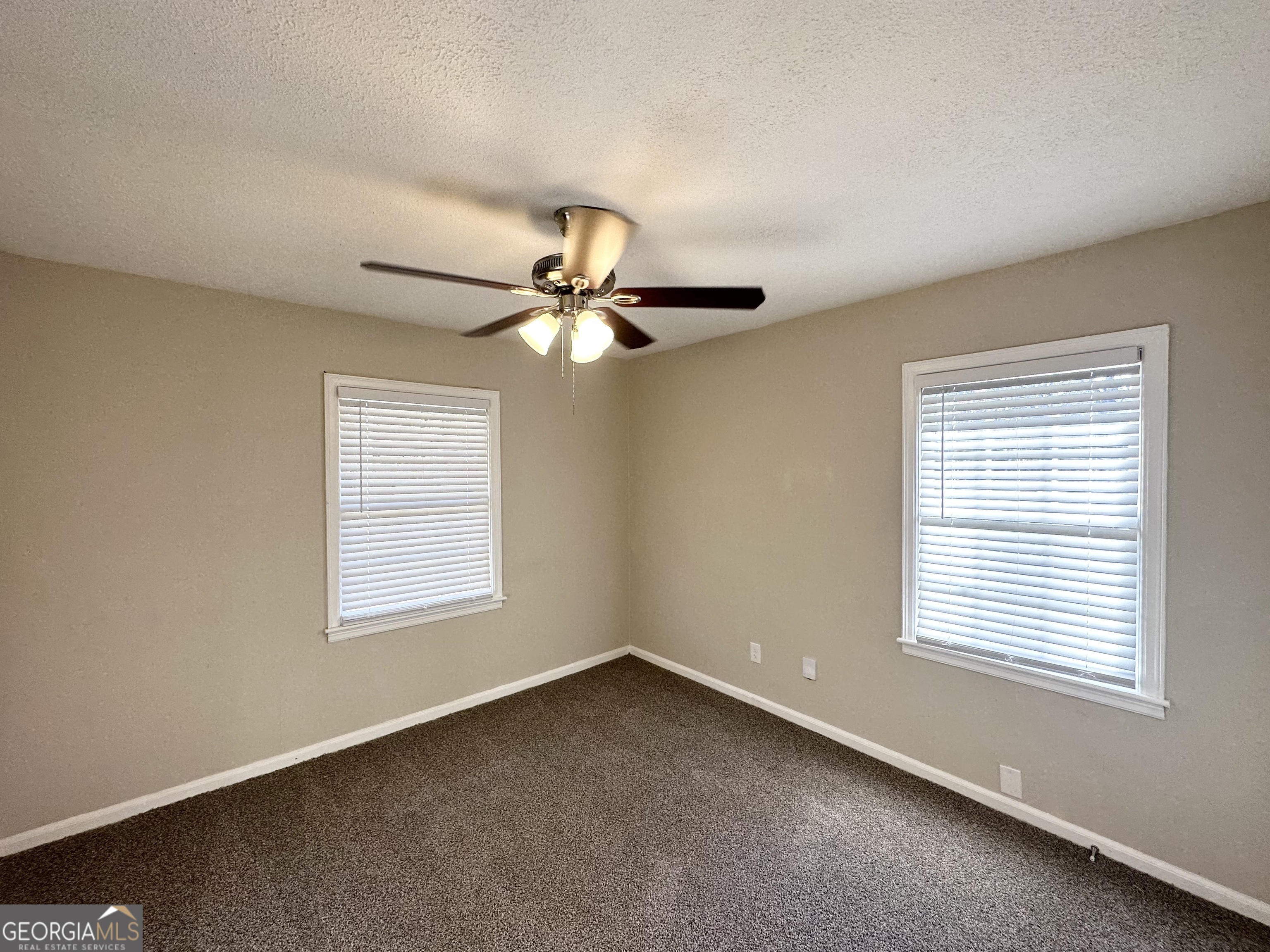 4267 Lamar Street Decatur, GA 30035 - Photo 7 of 14 a view of an empty room with a window