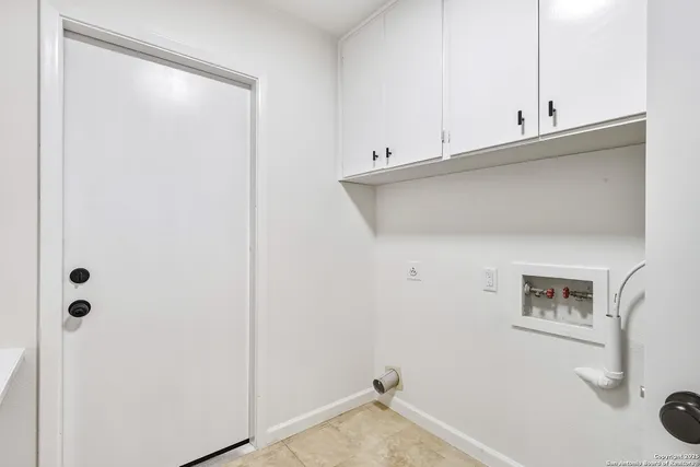 a view of a hallway with closet