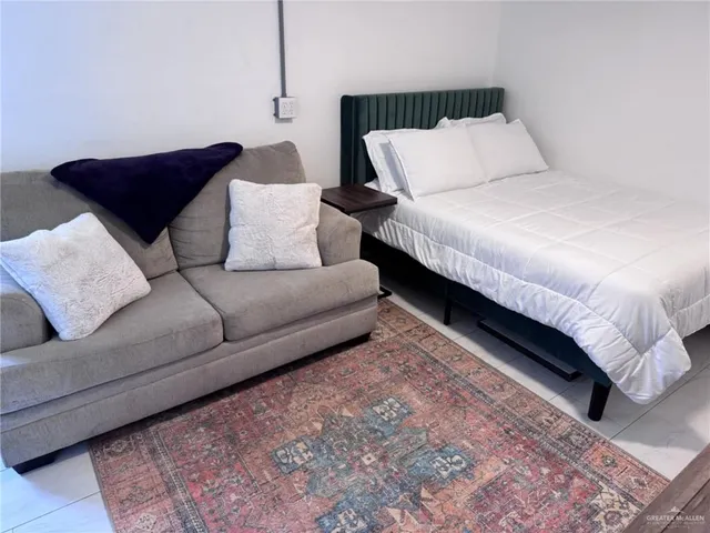 a living room with furniture and a couch