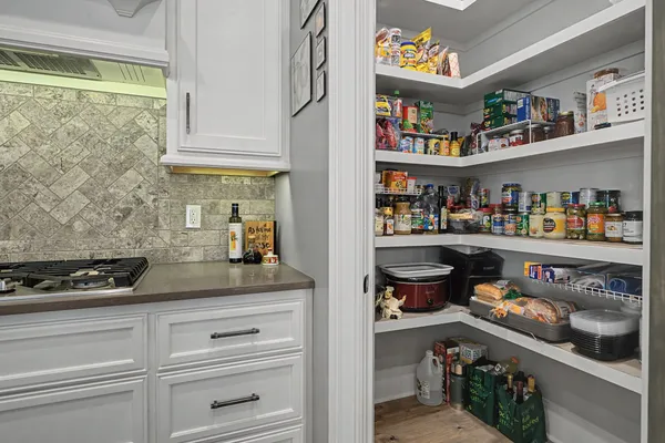 a kitchen with a lot of different kinds of food
