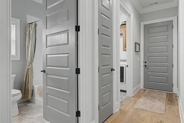 a bathroom with a shower and a toilet