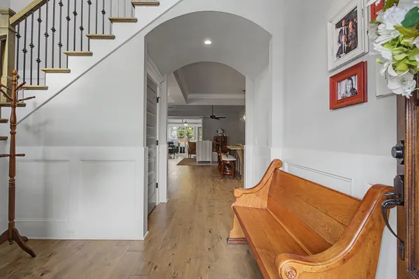 a view of a living room and entryway