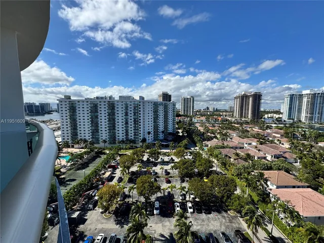 a view of a city with lots of trees