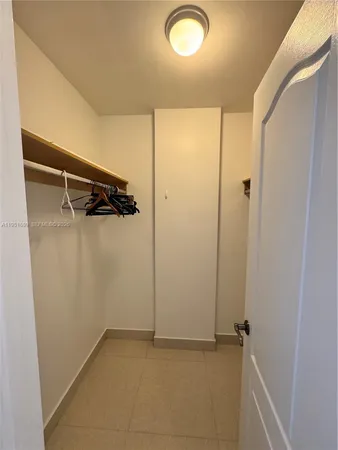 a bathroom with a sink a toilet and a shower