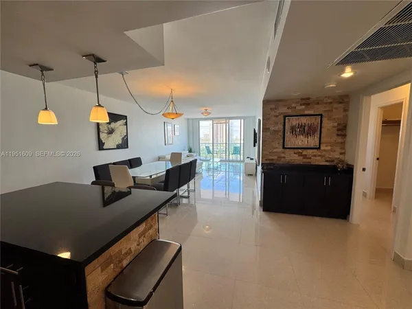 a view of a city with lot of flowers