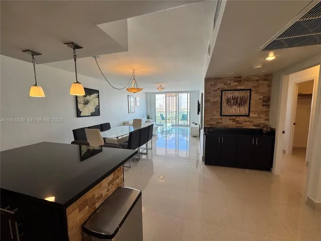 a view of a city with lot of flowers