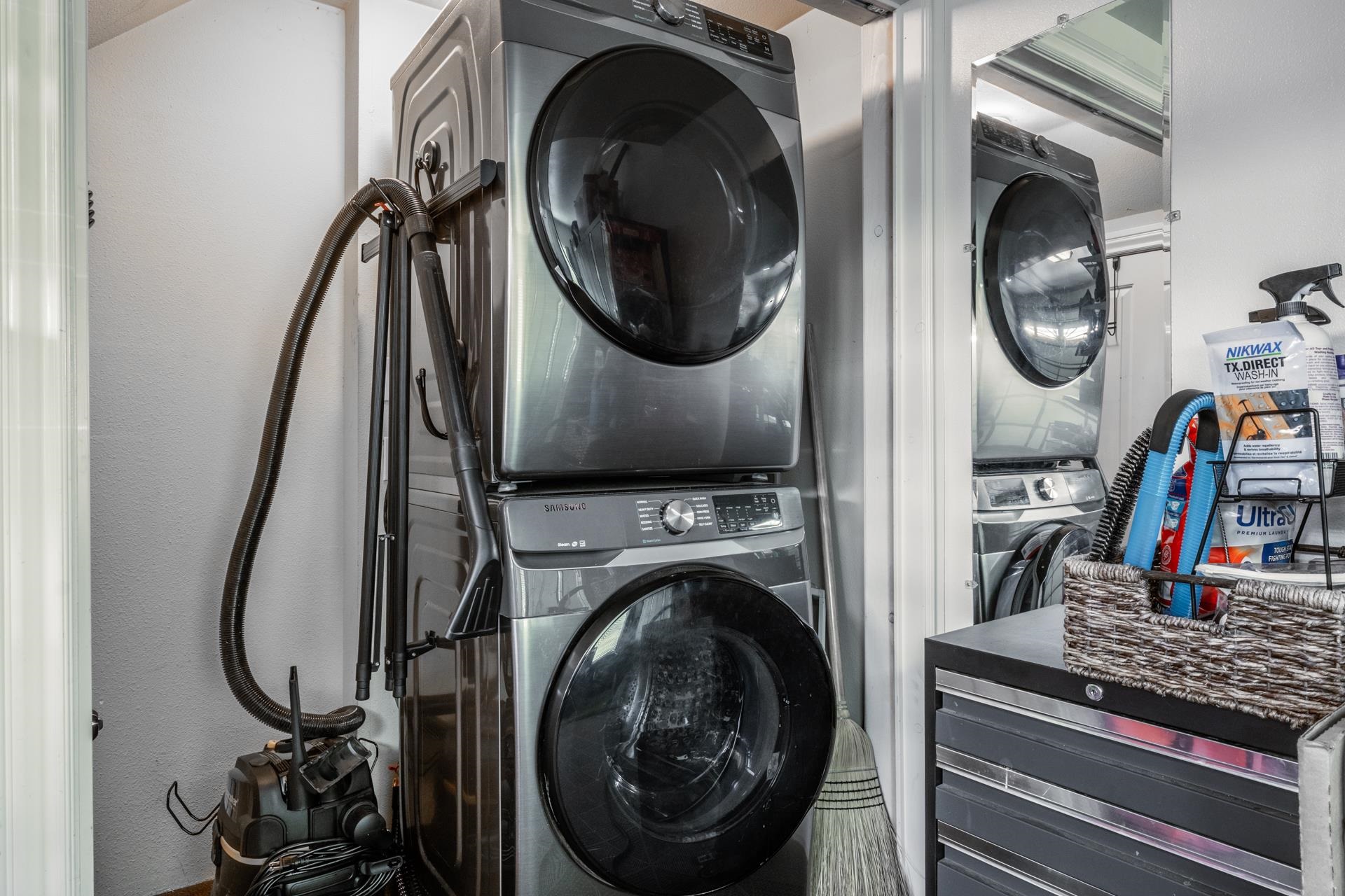1787 Old Mammoth Road, Unit 2 Mammoth Lakes, CA 93546 - Photo 23 of 29 Dedicated laundry area featuring a stacked washer and dryer
