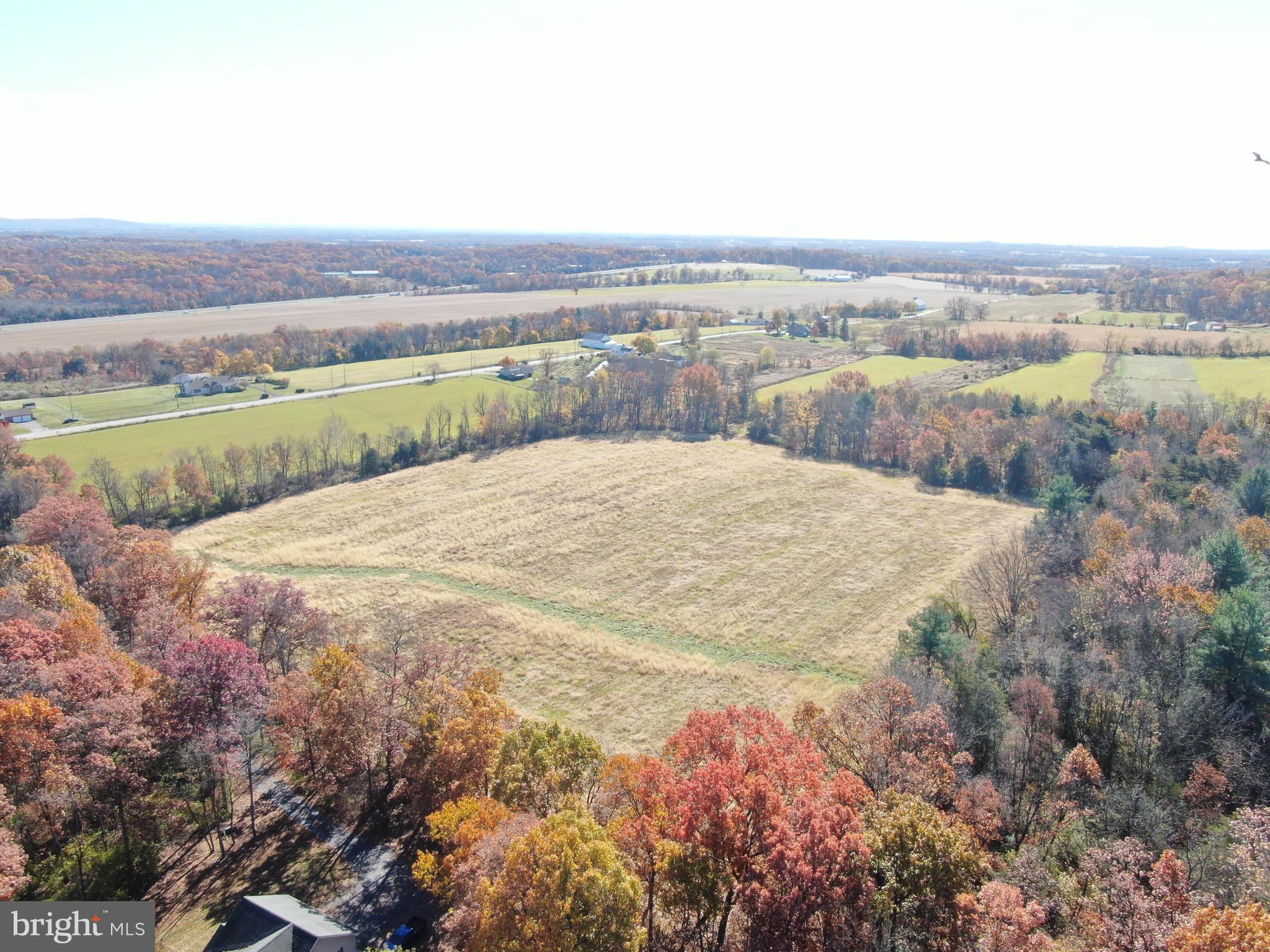 1 38.37 /- Acres Old Harrisburg Road York Springs, PA 17372 - Photo 4 of 29 a view of a lake with a city