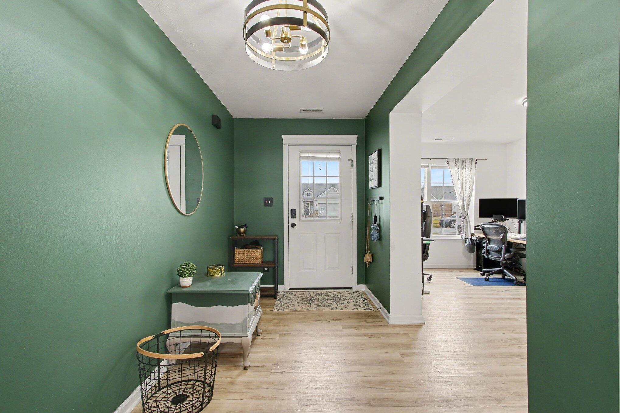 15549 West 101st Place Dyer, IN 46311 - Photo 2 of 14 a view of a livingroom with furniture and hardwood floor