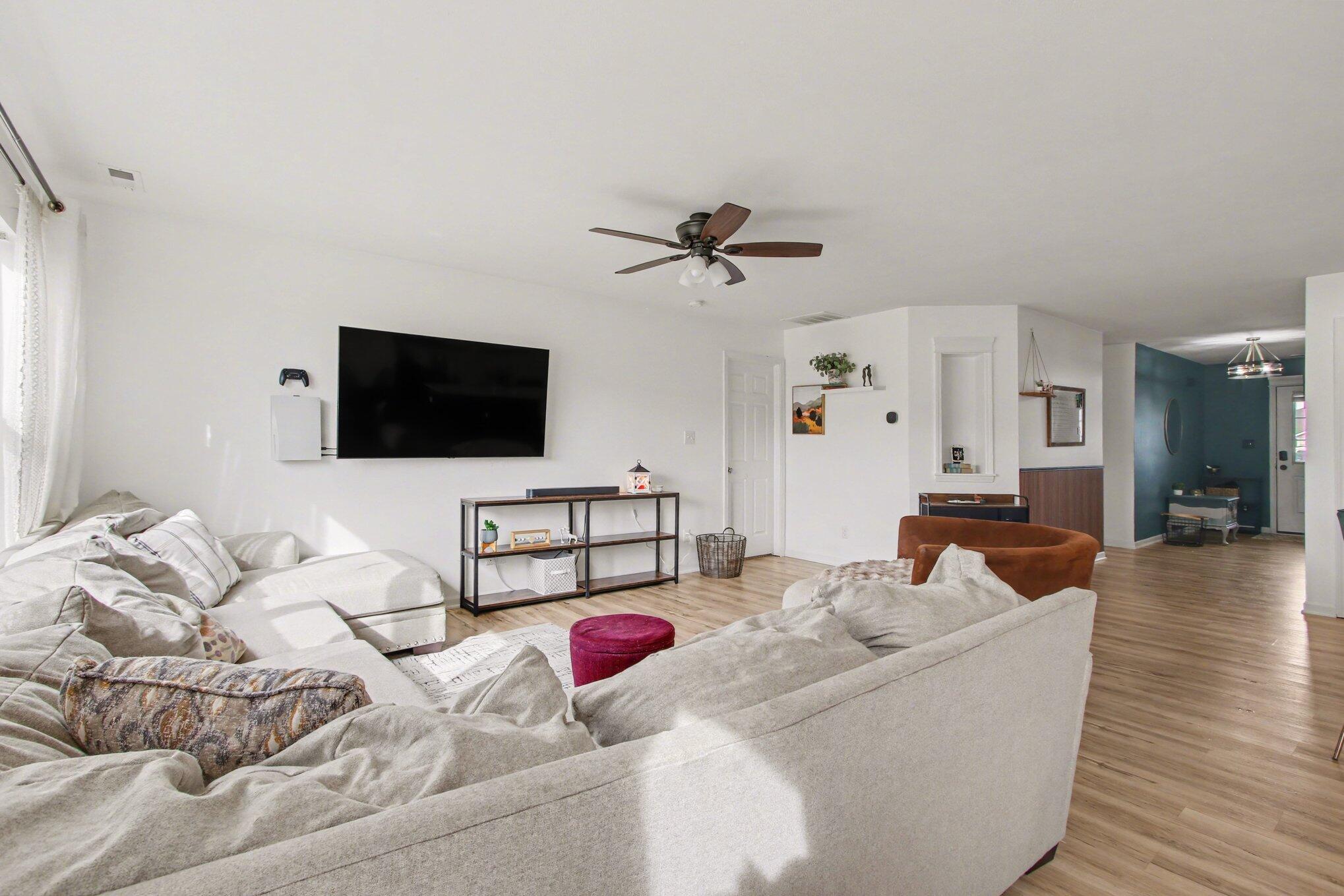 15549 West 101st Place Dyer, IN 46311 - Photo 3 of 14 a living room with furniture and a flat screen tv