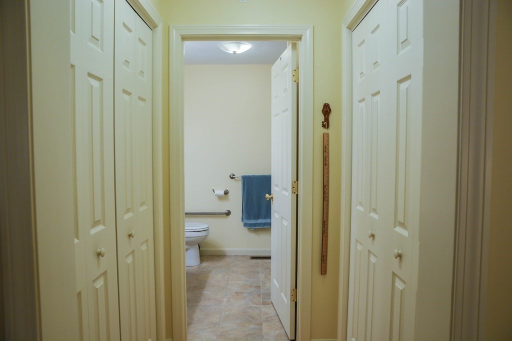 39 Riley Road, Unit 51 Lunenburg, MA 01462 - Photo 16 of 42 a bathroom with a shower and a toilet