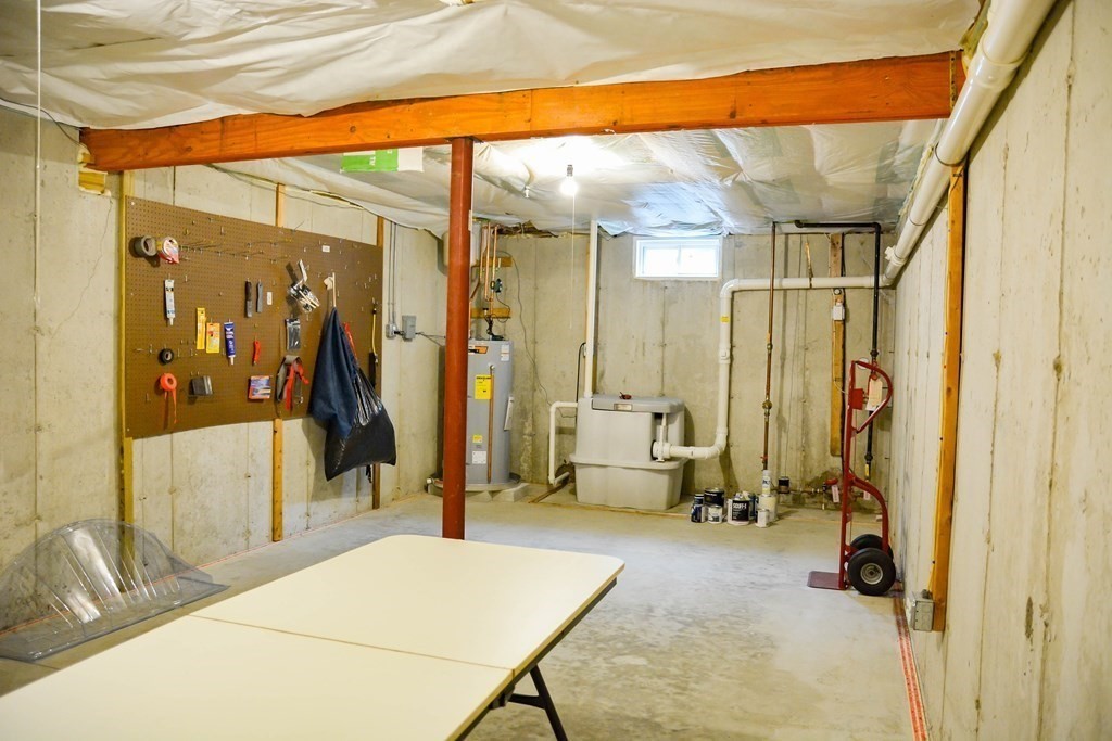 39 Riley Road, Unit 51 Lunenburg, MA 01462 - Photo 31 of 42 a en suite bathroom with a tub and mirror