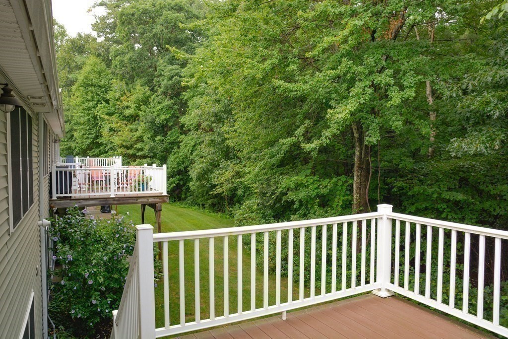 39 Riley Road, Unit 51 Lunenburg, MA 01462 - Photo 35 of 42 a balcony with an outdoor space