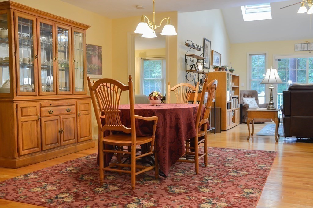 39 Riley Road, Unit 51 Lunenburg, MA 01462 - Photo 6 of 42 a view of a dining room with furniture window and wooden floor