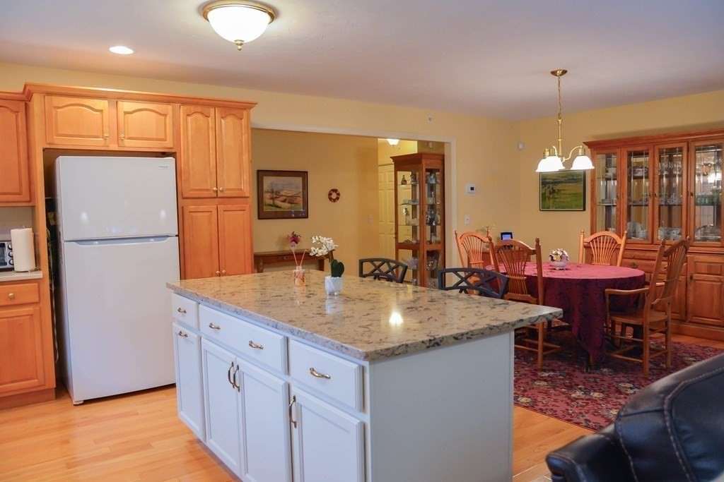 39 Riley Road, Unit 51 Lunenburg, MA 01462 - Photo 10 of 42 a view of a kitchen counter space and breakfast area