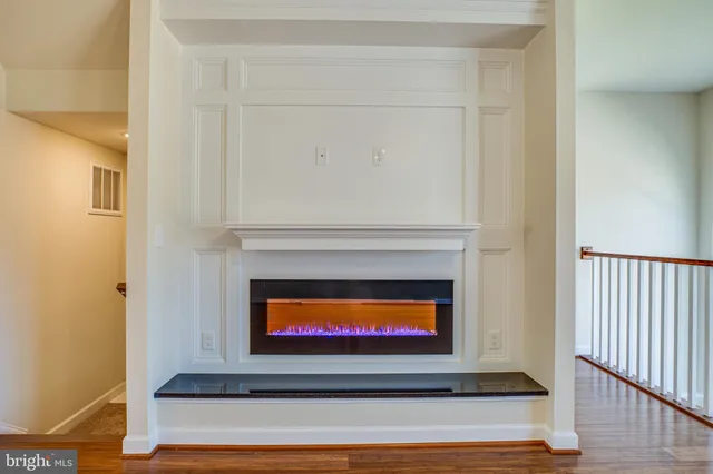 a living room with a fireplace