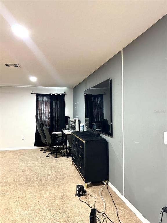 13809 Felix Will Road Riverview, FL 33579 - Photo 32 of 75 a view of a workspace with furniture