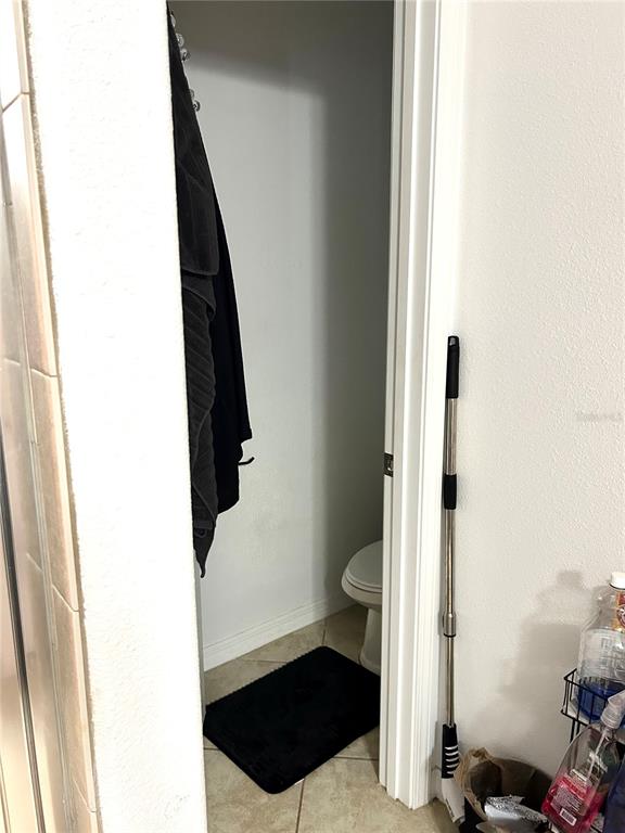 13809 Felix Will Road Riverview, FL 33579 - Photo 44 of 75 a bathroom with a toilet and a shower