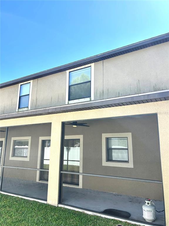 13809 Felix Will Road Riverview, FL 33579 - Photo 71 of 75 a front view of a house with a yard