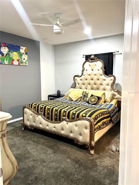 13809 Felix Will Road Riverview, FL 33579 - Photo 9 of 75 a bedroom with a bed and window