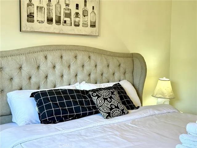 a view of a door and wooden floor