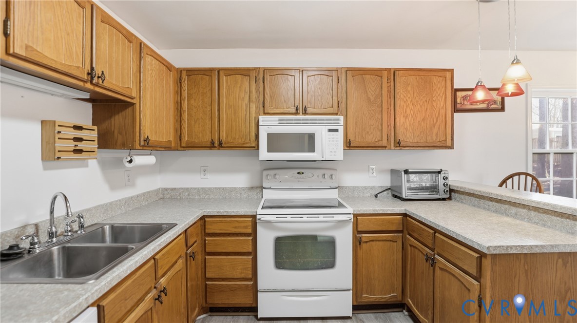 408 Springdale Avenue Colonial Heights, VA 23834 - Photo 15 of 49 Kitchen with white appliances, decorative light fi