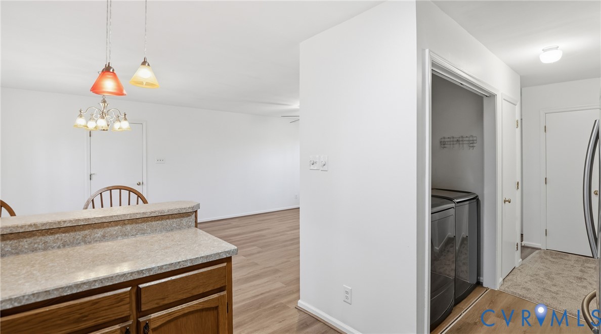 408 Springdale Avenue Colonial Heights, VA 23834 - Photo 16 of 49 Kitchen with decorative light fixtures, light wood