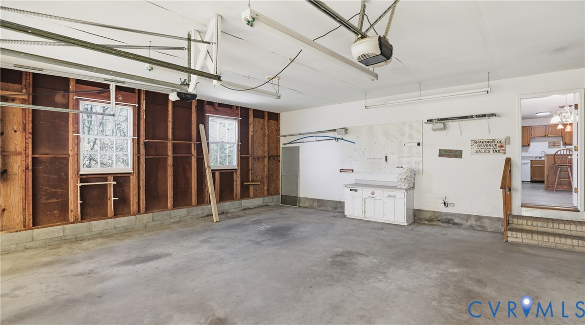 408 Springdale Avenue Colonial Heights, VA 23834 - Photo 22 of 49 Garage with a garage door opener