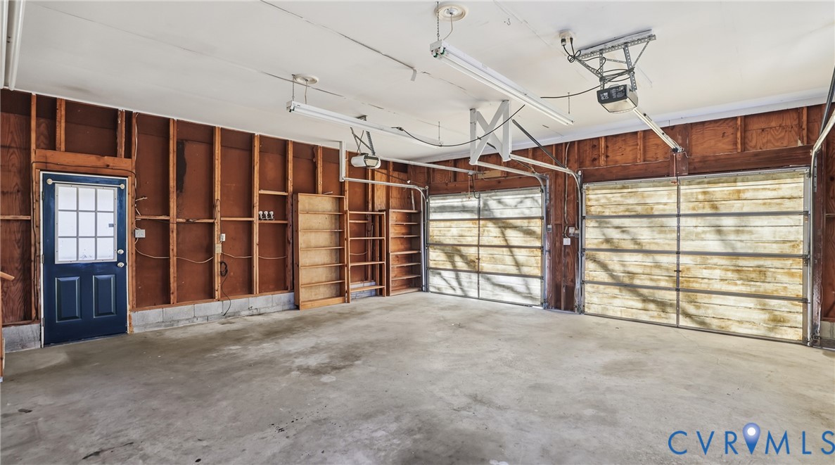408 Springdale Avenue Colonial Heights, VA 23834 - Photo 23 of 49 Garage featuring a garage door opener