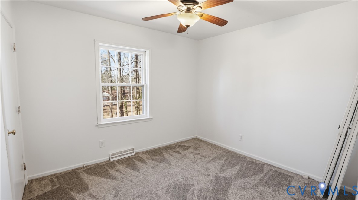408 Springdale Avenue Colonial Heights, VA 23834 - Photo 27 of 49 Carpeted empty room with baseboards and a ceiling