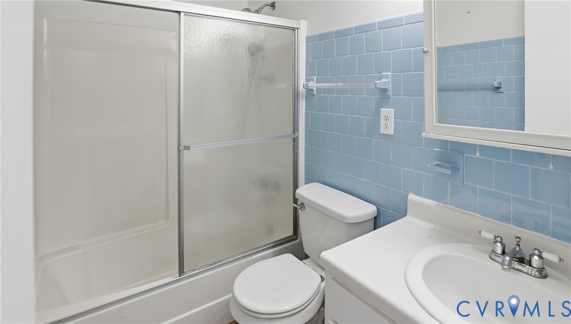 408 Springdale Avenue Colonial Heights, VA 23834 - Photo 28 of 49 Full bath featuring tile walls, vanity, and enclos