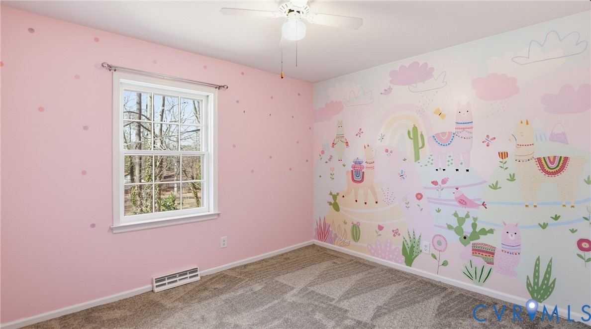 408 Springdale Avenue Colonial Heights, VA 23834 - Photo 30 of 49 Carpeted spare room with baseboards and a ceiling