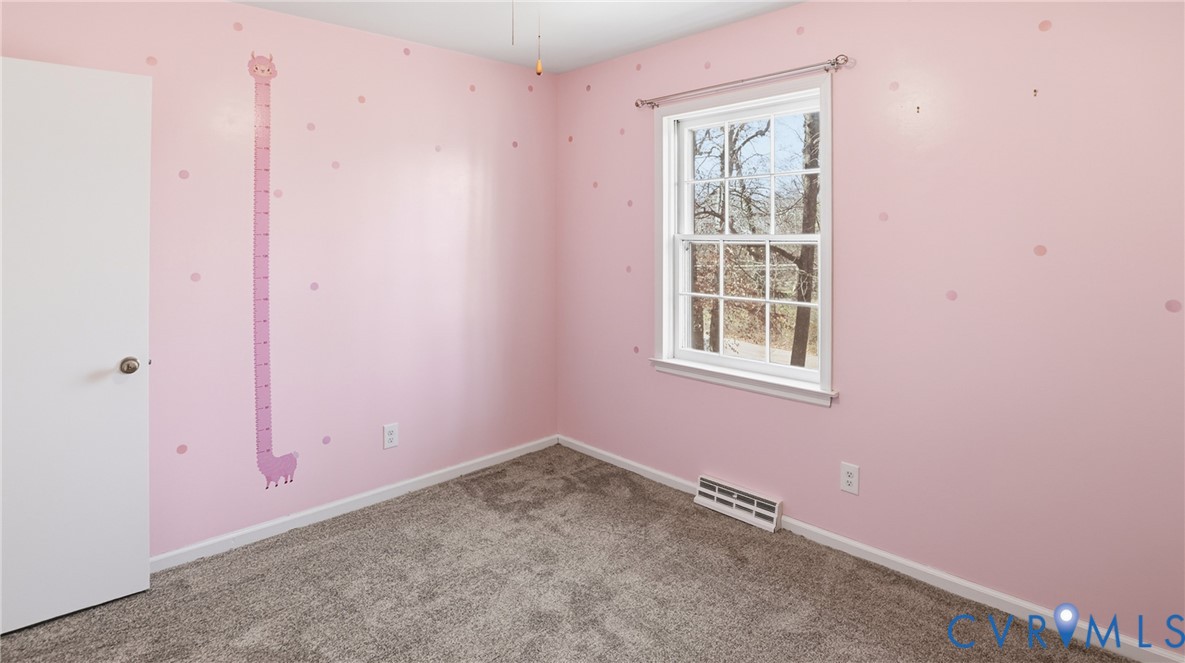 408 Springdale Avenue Colonial Heights, VA 23834 - Photo 32 of 49 Carpeted empty room with baseboards