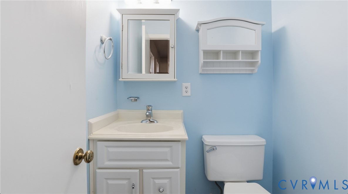 408 Springdale Avenue Colonial Heights, VA 23834 - Photo 37 of 49 Half bathroom featuring vanity and toilet