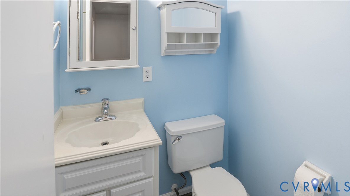 408 Springdale Avenue Colonial Heights, VA 23834 - Photo 38 of 49 Half bathroom featuring vanity and toilet
