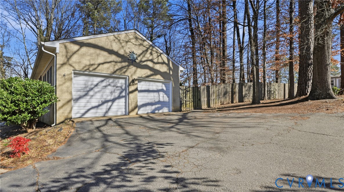 408 Springdale Avenue Colonial Heights, VA 23834 - Photo 4 of 49 Garage with asphalt driveway