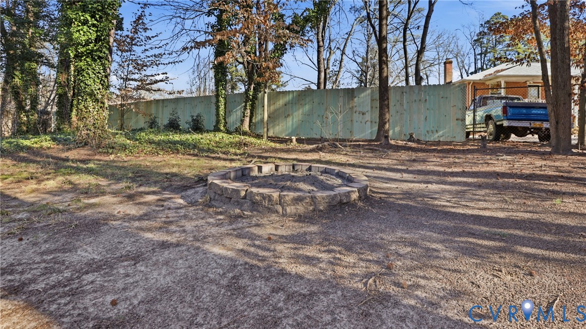 408 Springdale Avenue Colonial Heights, VA 23834 - Photo 42 of 49 View of yard featuring a fire pit