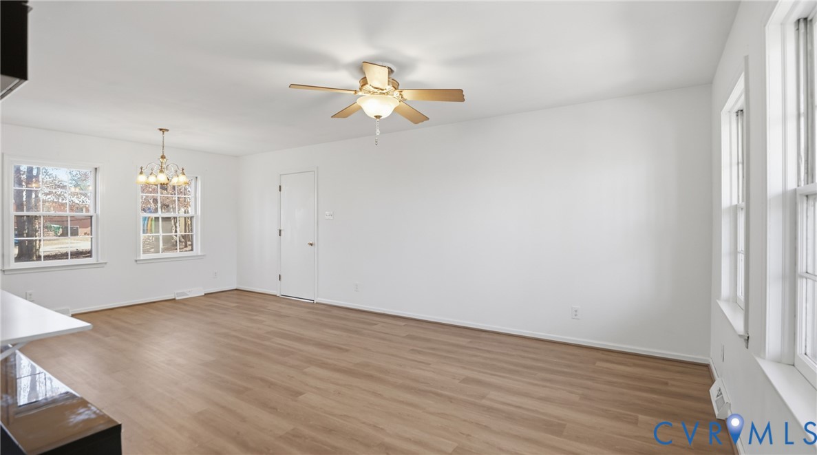 408 Springdale Avenue Colonial Heights, VA 23834 - Photo 6 of 49 Unfurnished living room featuring light wood finis