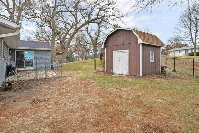 a house with trees in the background