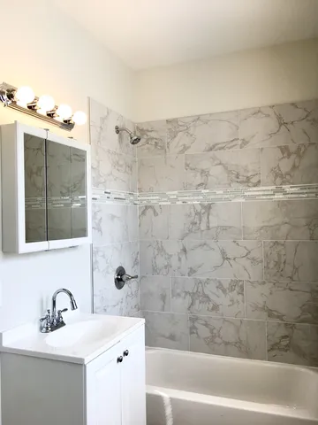 a bathroom with a sink and a bathtub